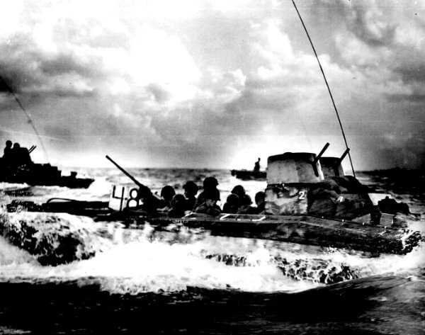 Marines on a water buffalo