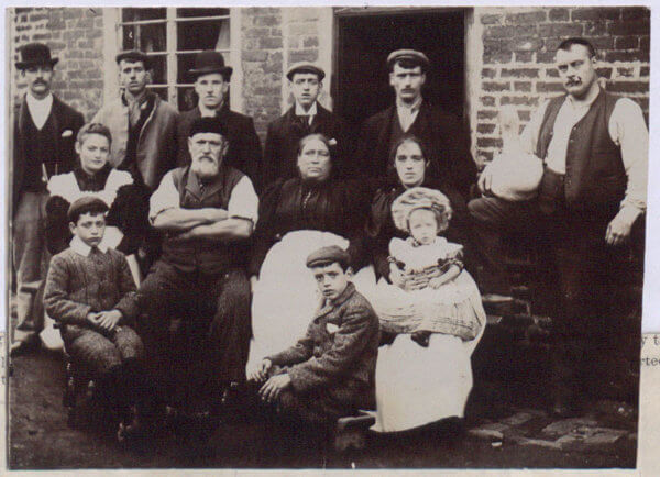 A photo of a working class family in the Victorian era